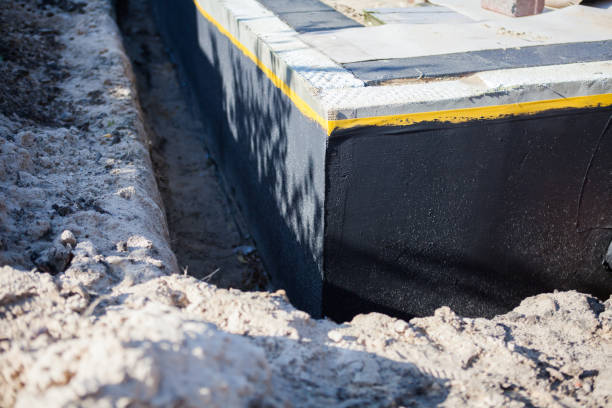 Professional Waterproofing technician working in Downers Grove, IL
